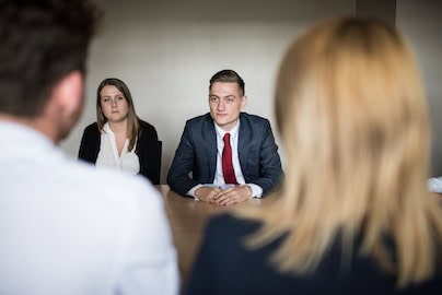 man and woman attending Edinburgh tribunal room