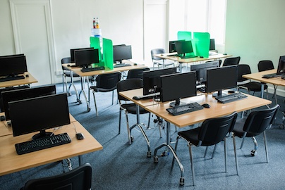 PC hire room set-up with patricians to divide work stations